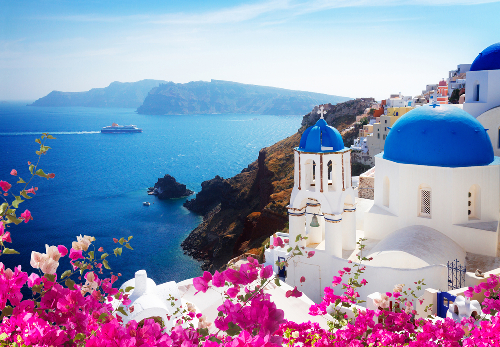Volcano Caldera With Blue Church Domes Oia With Flowers Santorini
