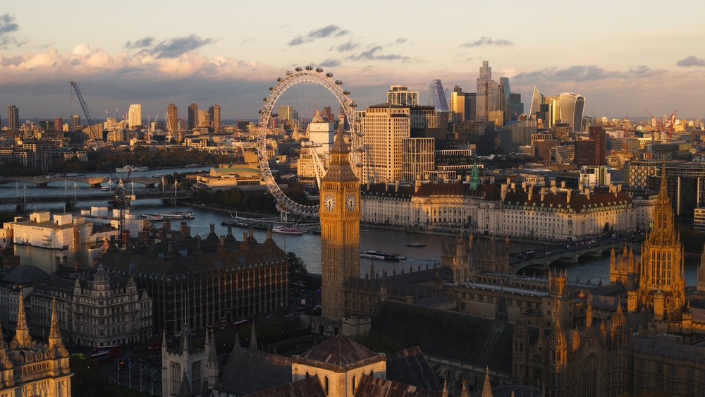 Sunset skyline view of London's biggest sights such as London Eye, Big Ben and Westminster