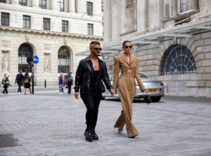 Male and Female walking outside during London Fashion Week