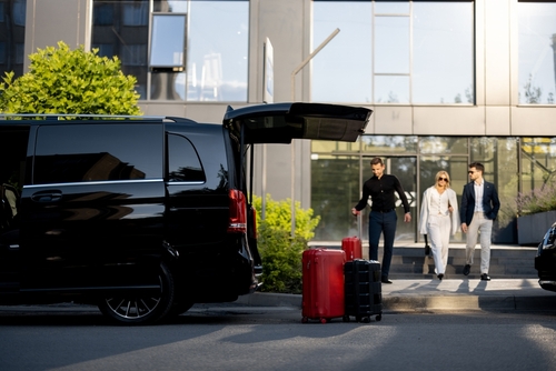 Family coming out of hotel
