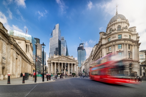 tour guide of london with big red bus