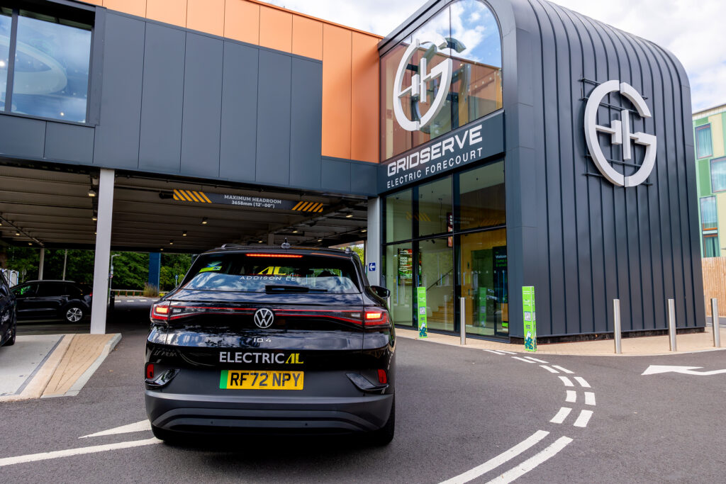 Addison Lee Car arriving at Gridserve Electric Charging Forecourt