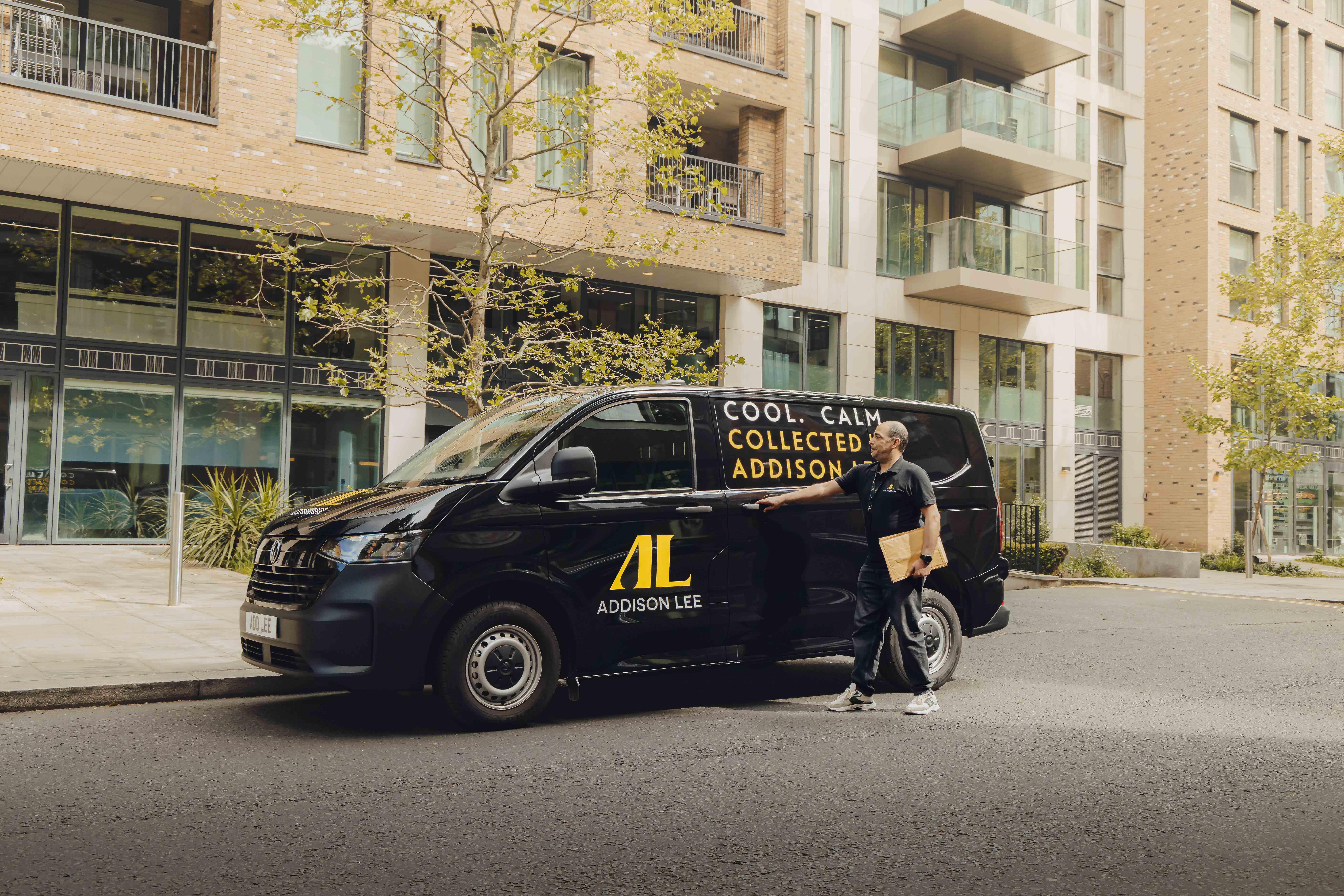 Addison Lee courier driver opening his van